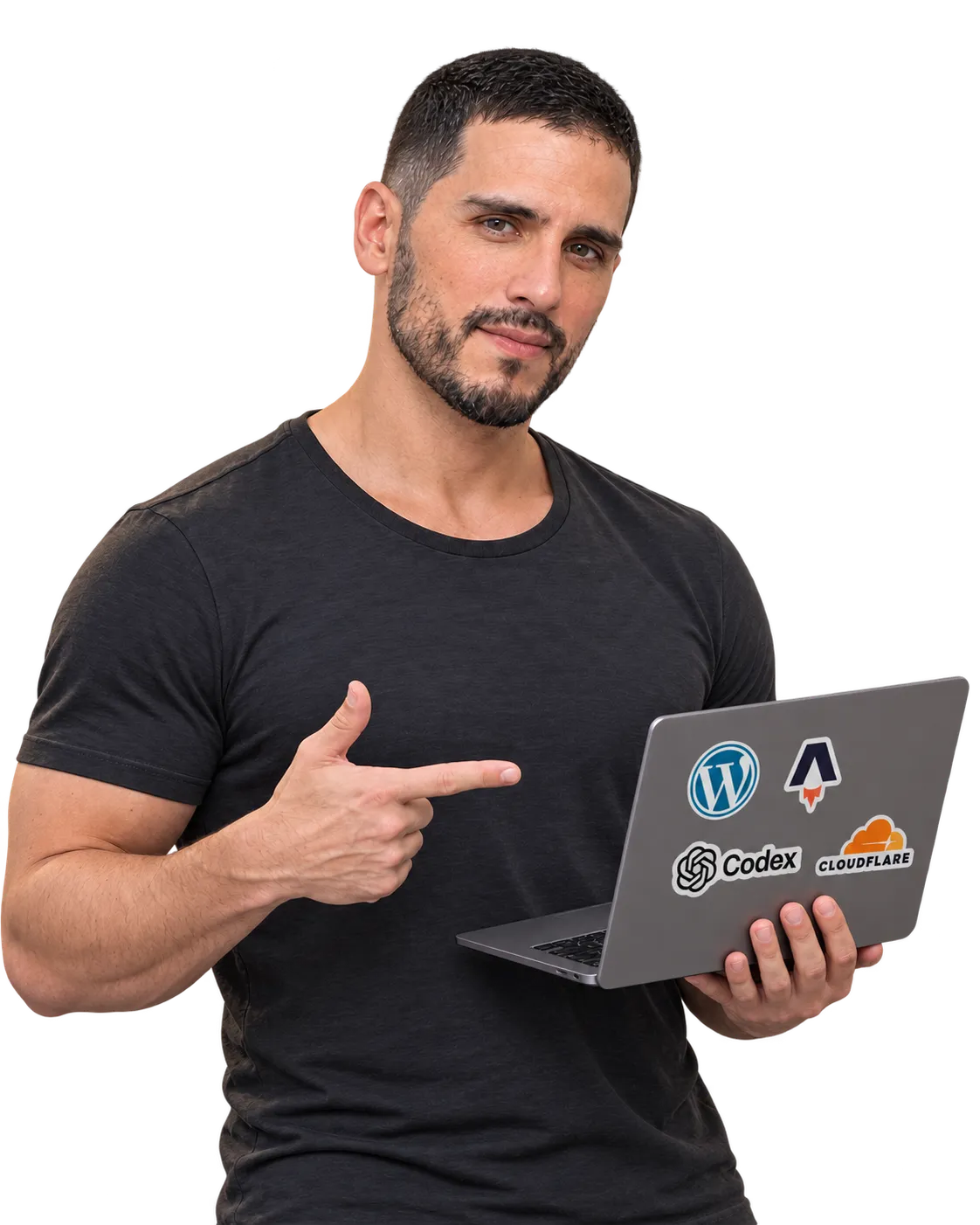 Julián, diseñador y desarrollador web, señalando las tecnologías de su portátil
